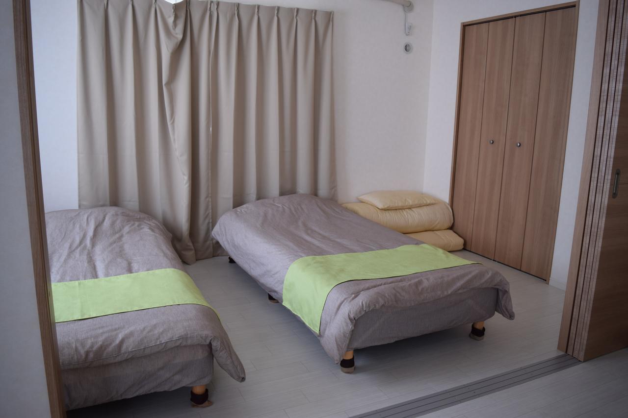 Rainbow Terrace Ginowan Apartment Екстериор снимка